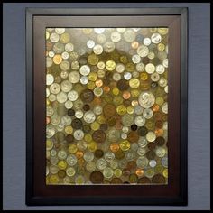 a painting with lots of different colored coins on it