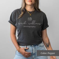 Looking for a photographer gift or shirts to show off your photography business? You've come to the right place! These personalized photographer tees are a great choice if you're out taking photos or curling up to do some editing. THE FIT Our unisex comfort color tees are very cute and comfy! You can pair them with your favourite leggings, tuck them into your jeans, or tie them up in a knot. We love this casual style and know you will too! MATERIALS AND SIZING These unisex comfort color tees are Colors Photography, Photography Shirts, Tshirt Photography, Photographer Logo, Nursing Student Gifts, Photographer Gifts, Nurse Sweatshirt, Photographer Shirts, Photography Gifts