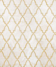 a white and gold wallpaper with an intricate design