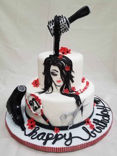 a birthday cake with a woman's face on it and scissors sticking out of the top