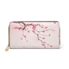 Cherry Blossoms for the Spring season! Made with cruelty-free faux leather, this wallet comes packed with utility and style. * Material: 100% PU leather * Durable high-quality nylon zip and alloy hardware * Gold color thread stitching * Pockets for cash, credit cards, coins, and checkbook * One size: 7.87" x 4.33" (20cm x 11cm) Clip Wallet, Money Clip Wallet, Zipper Wallet, Spring Season, Cherry Blossoms, Money Clip, Purse Wallet, Cherry Blossom, Wallets