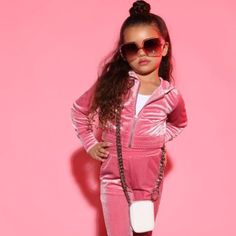 Mini Down To Lounge Velour Hoodie/Jogger Pant Set - Pink *Sold Out Online Sizes: 6(5-6y: 45-48" Height, 46-53 Lbs, 23-24" Waist, 19-20.5" Inseam) 7(6-7y: 48-51" Height, 53-60 Lbs, 24-25" Waist, 20.5-22" Inseam) 8(7-8y: 51-54" Height, 60-67 Lbs, 25-26" Waist, 22-23.5" Inseam) Velour Pant Set Long Sleeve Cropped Zip Front Smocked Waist Hoodie Slim Jogger Pockets Mommy And Me "Down To Lounge Pant Set" 92% Polyester 8% Spandex Imported Pink Trendy Winter Tracksuit, Trendy Pink Winter Sets, Mint Pants, 2 Piece Short Set, Slim Joggers, Girlie Girl, Jumpsuit For Kids, Velour Pants, Velour Hoodie