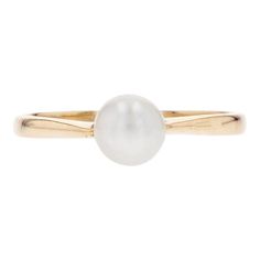 This is part of Chairish’s Fine Jewelry assortment.  Ring in 18 karat yellow gold.   Sober and elegant, this fine ring features a solitaire white orient cultured pearl.   Diameter of the pearl : 5.5/6 mm approximately.   Height : 5.6 mm approximately, width : 5.6 mm approximately, thickness : 6.2 mm approximately, width of the ring at the base : 1.8 mm approximately.   Total weight of the jewel : 1,6 g approximately.   US Size : 7.5 ;    Authentic antique jewelry - Work of the 1960s.   This item has been used and may have some minor flaws. Before purchasing, please refer to the images for the exact condition of the item.  Please refer to the dimensions in the description above for accurate measurements. Please reach out to the seller with any questions on dimensions or fit prior to purchas Gemstone Solitaire Ring, Yellow Gold Solitaire Ring, Sapphire Solitaire Ring, Yellow Gold Solitaire, White Gold Solitaire, Gold Solitaire Ring, Sapphire Solitaire, Fine Ring, Contemporary Ring