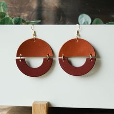 All the fun of big, bold geometric earrings with none of the weight! the Details ﻿- 3" drop x 2" W Geometric Leather Earrings, Modern Handmade Geometric Earrings, Handmade Modern Geometric Earrings, Bold Geometric Earrings With Bold Design, Bold Geometric Designed Earrings, Trendy Brown Earrings, Handmade Brown Geometric Earrings, Modern Brown Drop Earrings, Bold Geometric Earrings