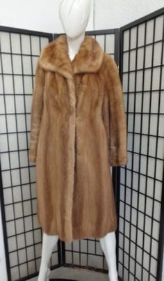 DESCRIPTION: BEAUTIFUL & VERY STYLISH PASTEL MINK FUR COAT FOR WOMEN. THE COLLAR TYPE IS "SHAWL" AND IT CLOSES WITH HOOK & EYE AND HAS TWO SIDE POCKETS. THIS ITEM IS PRE-OWNED: THE FUR AND INSIDE LINING ARE "MINT", THE SECOND BEST CONDITION POSSIBLE! AFTER BUYING THIS ITEM, IT WOULD BE VERY MUCH APPRECIATED IF YOU COULD PROVIDE YOUR HEIGHT, WEIGHT AND BUST CIRCUMFERENCE, SO WE CAN ADJUST THE COAT TO YOUR SIZE, BEFORE SHIPPING, IF NEEDED. IT WILL ALSO HELP US TO SHIP YOUR ITEM SOONER, THANK YOU! Elegant Full Length Spring Outerwear, Elegant Full-length Outerwear For Fall, Elegant Full Length Outerwear For Fall, Classic Long Fur Coat For Fall, Classic Long Sleeve Fur Coat For Fall, Fitted Full-length Formal Outerwear, Formal Fitted Full-length Outerwear, Classic Fur Coat With Pockets For Fall, Elegant Long Mink Outerwear