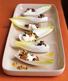 an image of appetizers on a plate with text that reads real simple 19 quick and easy appetizers