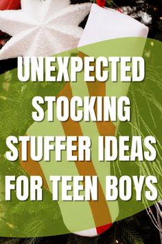 an ornament hanging from a christmas tree with the words unexpected stocking stuff for teen boys