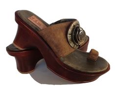 Jim Barnier Wooden Heel Clog Platform/Sandals Savage Lamb Brown Leather Size 6 Pre-Owned Jim Barnier clogs/sandals in good shape. With chocolate brown ring toes. Savage Lamb Leather upper and wooden soles and heels. Padded insole Please check all the pictures. Some signs of normal wear. Wooden heels shows some wear,insole of the shoes are clean and upper leather in very good condition.On the bottom of the shoes shows light wear. Please let me know if you have any questions. Avery Aesthetic, Moss Mirror, Vintage Clogs, Clogs Sandals, Hippie Shoes, Brown Ring, Oc Creator, Wooden Heels, Wooden Clogs