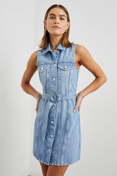 Your '90s-inspired dream dress has arrived. The Wilshire is a mini-length denim dress featuring a full button front, retro-inspired lines, and an adjustable belt. Washed in a bright blue, this is a must for summer days. 100% Cotton. Imported. Denim Sweater Jacket, Spring Denim, Nye Outfits, Fall Denim, Denim Sweater, Blue Dream, Black Wedding Dresses, 90s Inspired, Adjustable Belt