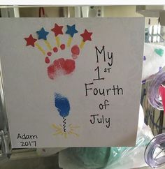 a sign that reads, my 1st fourth fourth of july with balloons and stars on it