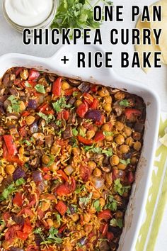 one pan chickpea curry and rice bake in a white casserole dish