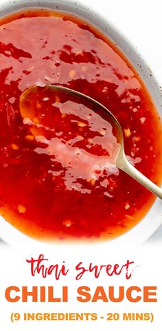 a spoon full of chili sauce on top of a white plate with the words thai street chilli sauce