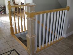 the stairs are white and yellow in this house