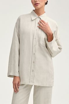 Introducing the Adalila Linen Button Down Top in Oatmeal. Crafted from luxurious linen, this top exudes effortless elegance with its classic button down design and straight sleeves. Comfort meets sophistication, making it a must-have for any wardrobe. Model is 5'7" and is wearing size XS. Classic Neutral Linen Tops, Classic Beige Linen Blouse, Classic Neutral Linen Top, Beige Linen Button-up Shirt, Chic Linen Top With Spread Collar, Collared Linen Blouse With Button Cuffs, Spring Button-up Flax Tops, Long Sleeve Linen Blouse With Button Closure, Linen Shirt With Button Cuffs For Daywear