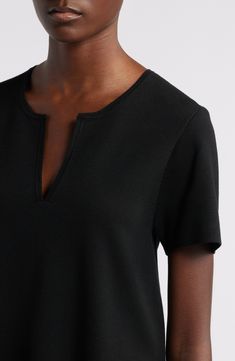 This smooth and lightweight sweater is knit with a split neck and sporty slits at the sides. Split neck Short sleeves Side slits 78% viscose, 22% nylon Dry clean Imported Relaxed Fit V-neck Knit Top For Work, Casual Viscose Top With Split Neck, Sleek Viscose V-neck Top, V-neck Ribbed Neckline Knit Top For Work, V-neck Knit Top With Ribbed Neckline For Work, Black Split Neck Top For Workwear, V-neck Knit Top With Ribbed Neckline, Fabric Gift Bags, Lightweight Sweater