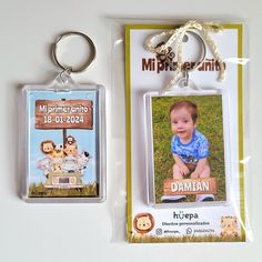 two key chains with pictures of children on them