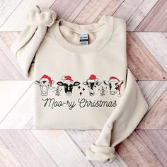 Retro Christmas Shirts For Cow Lovers ,Cow Mama Xmas Shirt,Holiday T-Shirts For Cow Owner,Trendy Animal Lover Tees,Black Cows Lover Gifts. Stay warm and stylish with this retro shirt! Made from cozy, soft fabric, this sweatshirt features a bold, eye-catching design that's perfect for any cow-loving mom who loves to stand out. Whether you're running errands or lounging at home, this sweatshirt is sure to become your go-to choice. The unique print adds a touch of attitude to your look, while the c Black Cows, Christmas Cows, Christmas Cow, Cow Shirt, Black Cow, Xmas Shirts, Holiday Sweater, Retro Shirts, Highland Cow