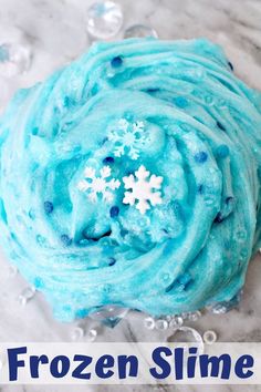 the frozen slime is made with blue icing and snowflakes on it