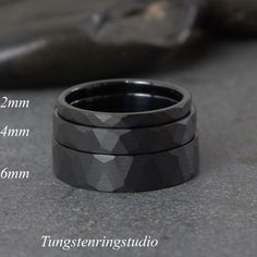 Sophisticated Hammer black Tungsten Ring.  The rings look great for every day or on your occasions.  Why Choose Us For Your Wedding Ring?      - Rings built to wear 24/7     - No need to maintain, no special instruction     - FREE Engraving service     - FREE Ring Sizer service     - FREE luxury zebra wood box     - LIFETIME WARRANTY      - Excellent customer service  PRODUCT DETAILS              THE PRICE IS FOR ONE RING ONLY     Metal: HAMMERED IP TUNGSTEN CARBIDE,       Color:    Black     Width:  2 MM, 4 MM, 6 MM     Band:   COMFORT FIT     Finish: POLISHED     Weight: 4 - 16 GRAMS      Tungsten rings cannot be resized once made.  FREE RING SIZER AVAILABLE  DO NOT KNOW YOUR SIZE? NO PROBLEM. If you are unsure of your ring size, choose "Ring Sizer Request". A reusable ring sizer will be Minimalist Stackable Black Rings, Minimalist Black Couple Rings For Anniversary, Minimalist Black Stackable Rings With Round Band, Black Minimalist Stackable Rings, Minimalist Black Stackable Rings, Black Minimalist Stackable Rings For Anniversary, Minimalist Black Stackable Rings For Anniversary, Man Ring, Black Tungsten Rings