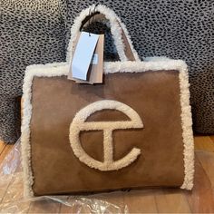 Never Used Telfar Bag Comes With Everything, Tag’s Attached Dust Bag Etc :) Ugg Telfar Bag Medium, Small Bag Outfit, Telfar X Ugg, Ugg Purses, Ugg Bag, Telfar Bag, Purse Outfit, Western Outfits Men, Chestnut Uggs