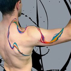 a man with colorful paint on his back