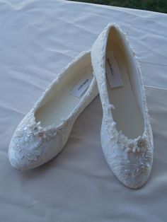 Ivory, or Champagne color lace over satin flat shoes. For more Champagne pictures please go to following link: https://www.etsy.com/listing/285556141/champagne-wedding-flats-shoes-lace? American Sizes: 5-10, *11 & 12 half and whole sizes. Width: B (standard) W (wide) 6W to 10W, and *11W & 12W *extra charge $10.00USD To buy color swatches: www.etsy.com/swatches/129787069/buy-color-swatch-samples-or-buy-lace FINAL SALE! THESE SHOES DESIGNS ARE NOT MASS PRODUCED THEY ARE HAND EMBELISHED AND White Lace Trim Closed Toe Wedding Shoes, Lace Flat Heel Wedding Shoes For Ceremony, Lace Wedding Shoes With Flat Heel, Flat Heel Lace Wedding Shoes, Lace Flat Heel Wedding Shoes, White Almond Toe Flats For Wedding, White Round Toe Flats For Wedding, Lace Flat Wedding Shoes, Lace Wedding Flats