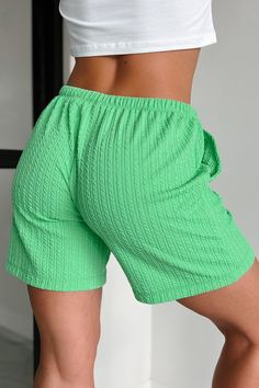 93% POLYESTER, 7% SPANDEX Model Wearing Size Small Color: Garden Green Textured Material Elastic Waistband Decorative Tie Detail Side Pockets Relaxed Fit Shorts Have Good Stretch 10“ Mid Rise 3“ Inseam For Model Size Specs Please Check Size Charts Launched: 4/12/24 Green Beach Bottoms With Built-in Shorts, Beachwear Bottoms For Spring Leisure, Spring Beachwear Bottoms For Leisure, Green Leisure Shorts With Pockets, Green Shorts With Pockets For Leisure, Green Leisure Shorts For Summer, Green Summer Bottoms For Leisure, Green Bottoms For Leisure In Summer, Summer Bottoms In Relaxed Fit Green