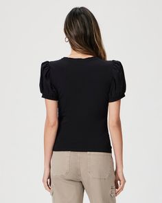 This short puff sleeve crew neck tee is the perfect mix of feminine and cool. Crafted from supremely soft cotton jersey in black, the Matcha Tee easily pairs well with any pair of denim in your closet. Relaxed Fit Puff Sleeve Tops For Casual Gatherings, Casual Fitted Short Sleeve Top With Puff Sleeves, Casual Fitted Short Sleeve Puff Top, Casual Fitted T-shirt With Puff Sleeves, Casual Fitted Puff Sleeve Top For Everyday, Casual Fitted Puff Sleeve T-shirt, Chic Relaxed Fit Puff Sleeve Top With Crew Neck, Chic Relaxed Fit Crew Neck Puff Sleeve Top, Casual Puff Sleeve T-shirt With Relaxed Fit