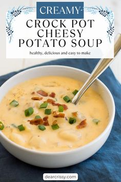 creamy crock pot cheesy potato soup with bacon and green onions in a white bowl