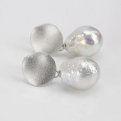 Item No:ERS246-WHITEItem:real freshwater baroque pearl earringsPearl shape:   oval/drop shapePearl size:around 11-12mm(wide)x14-16mm longPearl skin: clean with some spotsPearl color:white colorPearl luster: highPearl quality: AMetal:sterling silver 925Please contact Lisha freely if you have any specific demand or need custom order,I will always try my best to meet your request.******************************************************************Need it sooner? Please select" Expedited Shipping-TNT" Silver Pear-shaped Hypoallergenic Pearl Earrings, Classic Silver Earrings With Baroque Pearl, Classic Silver Baroque Pearl Earrings, Formal Silver Baroque Pearl Earrings, Silver Earrings With Baroque Pearl Pendant, Silver Baroque Pearl Earrings In Pear Shape, Silver Oval Pearl Drop Earrings, Silver Teardrop Baroque Pearl Jewelry, Minimalist Silver Pear-shaped Pearl Earrings