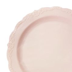 an empty pink plate on a white background