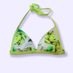 Brand New! Never Worn! Cute White And Green Printed Bikini Top. Easily Mix And Match This Top With Black, White Or Green Colored Bottoms. Bundle And Save! :) Green Triangle Halter Top With Built-in Bra, Tropical Triangle Halter Top For Vacation, White Halter Neck Swimwear With Tropical Print, Green Halter Top With Built-in Bra For Summer, Summer Tropical Print Triangle Halter Top, Summer Green Halter Top For Swimming, Green Tropical Halter Top For Summer, Tropical Print Halter Top For Poolside And Beach Season, Tropical Print Halter Top For Beach Season Poolside