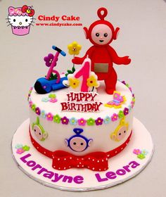 a birthday cake with an image of a monkey on top