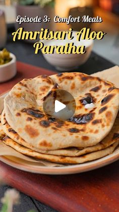 two flat breads sitting on top of a plate