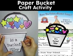 a hand holding a paper bucket craft activity with the text, is a bucket filler?