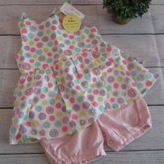 Cheerful Printed Dots Instantly Charm On This Sweet Skirted Cotton Sunsuit From Starting Out. Skirted Design - Great For Easter! Snap Closure At Back; Snap Closures At Bottom Footless Cute Polka Dot Sets For Spring, Cute Polka Dot Spring Sets, Polka Dot Cotton Sets For Spring, Spring Cotton Sets With Polka Dot, Spring Cotton Sets In Polka Dot, Spring Cotton Polka Dot Sets, Spring Polka Dot Cotton Sets, Playful Polka Dot Sets For Spring, Playful Polka Dot Spring Sets