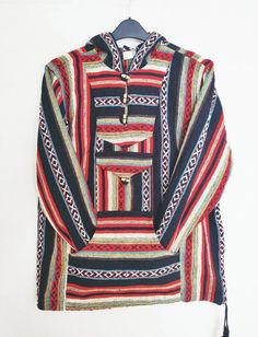 New Unisex Hippie Boho Bohemian Retro funky Multi Color Baja Festival Summer Cotton Stripe Hoodie Jumpers cardigan Nepalese Pullover Poncho  UNIQUE NICE AND COMFY BAJA  PULLOVER. This style is hippie sub-culture or cholo lifestyle and  for funky looks. Simply can wear in holidays or short breaks or even better in festivals.Or it is perfect to wear  Long casual day wear.  Fits both men and women perfectly. 💯%Cotton Fabric  HANDMAND IN KATHMANDU NEPAL PLEASE NOTE: there may be slight variation in Bohemian Long Sleeve Tops With Pockets, Hooded Cotton Top For Festivals, Bohemian Hooded Top For Fall, Bohemian Long Sleeve Patchwork Sweater, Multicolor Long Sleeve Hippie Tops, Casual Winter Festival Sweater, Multicolor Hippie Tops For Winter, Hippie Blue Long Sleeve Outerwear, Multicolor Long Sleeve Sweater With Pockets