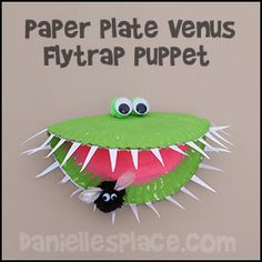 the paper plate venus flytrap puppet is made to look like a monster