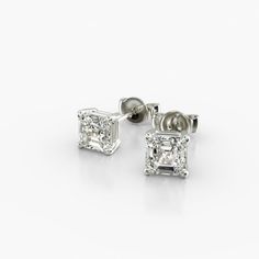 Platinum Asscher Cut Shape Diamond Stud Earrings (Mounting). This pair of classic, asscher shape diamond earrings feature a tapered basket that showcases the unique characteristics of the asscher shape diamonds of your choice. The bold flashes of light and a luminescent nature capture the eye with every move. Classic Cushions, Basket Setting, Gold Cushions, Unique Characteristics, Asscher Cut, Diamond Stud Earrings, Diamond Stud, Fine Jewellery Earrings, Lab Created Diamonds