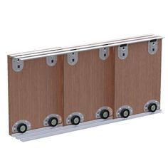 four rollers are attached to the side of a wooden paneled wall with wheels