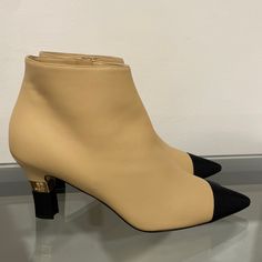 Brand New Chanel Boots, Beige With Black Toe And Heel, Gold Chanel Insignia On Boot Heels. I’m A Size 8.5 In Average Us Shoes And These Fit Perfectly. Never Worn, Just Tried On In The Store And At Home On Carpet. Bought Them At Chanel In Holt Renfrew In Toronto Two Weeks Ago. Chanel Ankle Boots, Black Velvet Boots, Boot Heels, Chanel Beige, Chanel Boots, Boots Beige, Glitter Boots, Knee High Heels, Black High Heel Boots