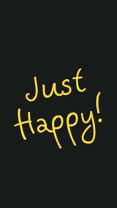 the words just happy written in yellow on a black background