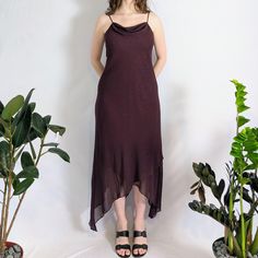 "Vintage sparkly 90s dress The most stunning burgundy chiffon maxi dress with sparkles dotted all over. Has a cowl neckline & non-adjustable spaghetti straps. Has an asymmetrical pointed hem. This dress is fully lined. Made in the 1990s by Melanie Lyne, made in Canada. Perfect condition Measurements taken flat Full measurements provided Tag size- 10 (medium/large) Chest- 32\" Waist- 30\" Hip- 40\" Length- lowest point 55\", highest point 45\" Fabric content- polyester" Summer Party Maxi Dress With Cowl Neck, Dress With Sparkles, Peter Pan Collar Blouse, Purple Maxi, 90s Dress, Ruffle Mini Dress, Chiffon Maxi, Pinafore Dress, Chiffon Maxi Dress