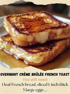 two grilled french toast on a plate with syrup