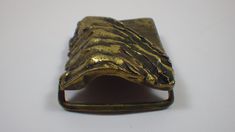 "This large rare belt buckle features a fascinating, textured abstract design in solid brass by jeweler and artist Bernard Kelly, measuring about 2\" x 1-1/2\" and in excellent preowned condition. It is marked \"Kelly II\" on the back and is ready to be supplied with belting of your choice. This dates from the 70's and is one of 3 in the series. Please see the attached photographs before making your purchase and note that we will be happy to combine shipments of multiple purchases." Collectible Antique Gold Belt Buckles, Collectible Gold Antique Belt Buckles, Gold Antique Belt Buckles For Collectors, Brass Belt, Brass Belt Buckles, Belt Buckle, Belt Buckles, Abstract Design, Etsy Vintage