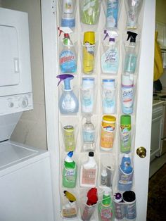 an open refrigerator filled with lots of cleaning products