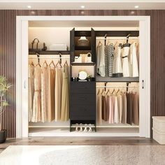 an open closet with clothes hanging on the shelves and shoes sitting on the floor in front of it