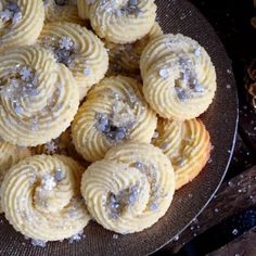 a plate filled with cookies covered in frosting