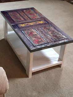 a coffee table with an artistic design on it