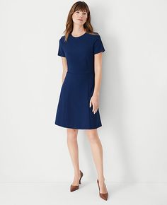 Elevate your wardrobe with the Petite Flare Dress in Fluid Crepe from Ann Taylor, a piece that marries elegance with comfort. This dress features a sophisticated crew neck and short sleeves, perfect for a variety of occasions from office hours to evening outings.

- Size: Petite 0
- Color: Pure Sapphire
- Material: 95% Polyester, 5% Spandex
- Fit: Tailored fit
- Length: Hits above the knee; 20" from natural waist
- Closure: Hidden back zipper with hook-and-eye
- Care: Machine washable

Designed Dress For Petite Women, Work Dresses For Women, Knitted Suit, Womens Business Casual, Dresses Dresses, Professional Dresses, Feminine Dress, Sleeve Dresses, Petite Dresses